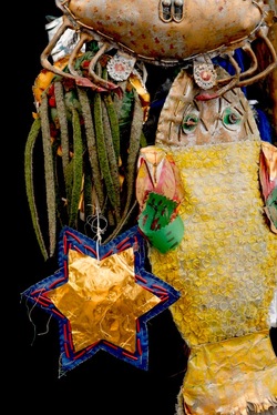 Carnival costume detail: discarded/recycled objects
